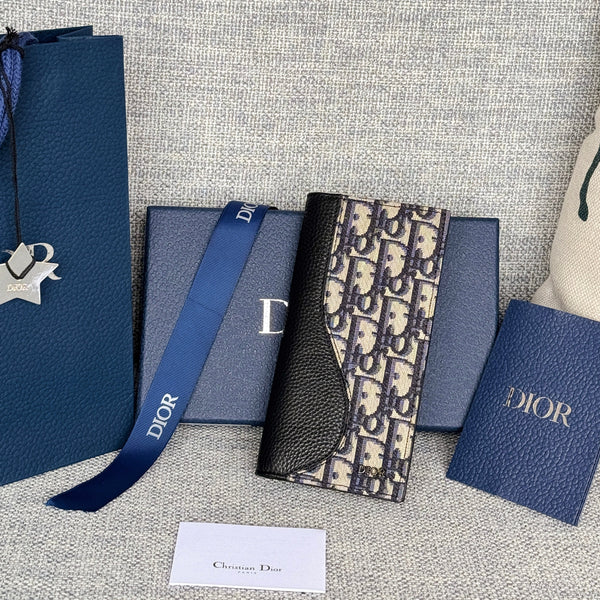 VERTICAL BIFOLD WALLET 19 IN BLACK GRAINED CALFSKIN MIX BLUE MONOGRAM OBLIQUE JACQUARD